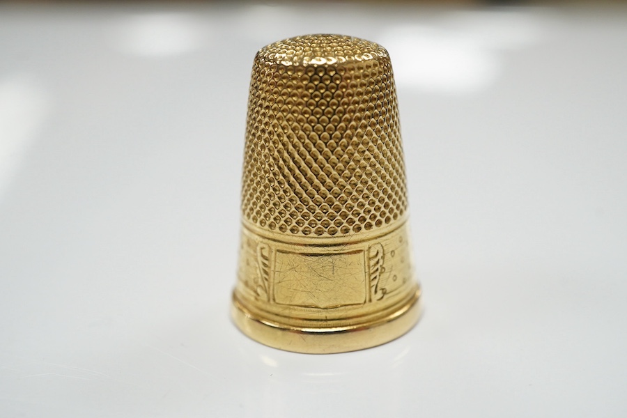 A cased French 18ct gold(eagles head mark) thimble, 4.3 grams. Condition - fair